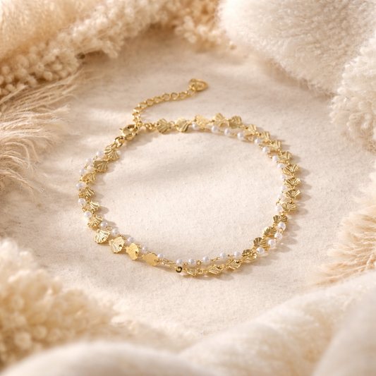 Chaîne de cheville dorée double rang avec coquillages pavées ✨