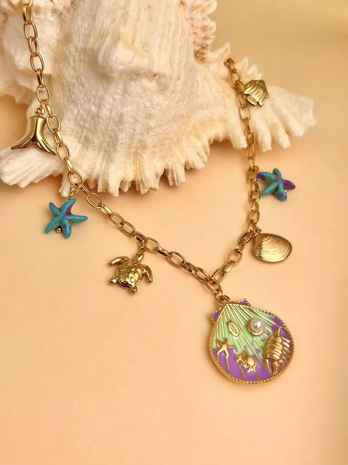 Collier coquillage et breloques en acier inoxydable violet