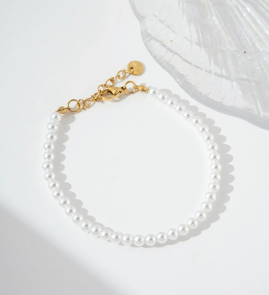 Bracelet perles blanches 4 mm fermoir doré acier inoxydable
